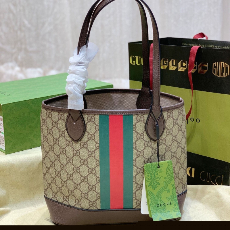 G*u*i shopping bags